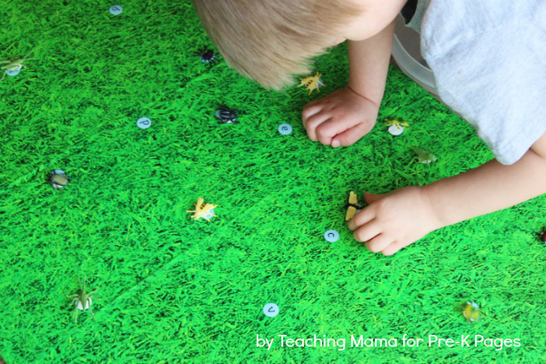Child playing Insect Matching Alphabet Game