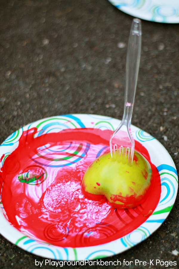 fork and apple in paint to create number line for classroom wall