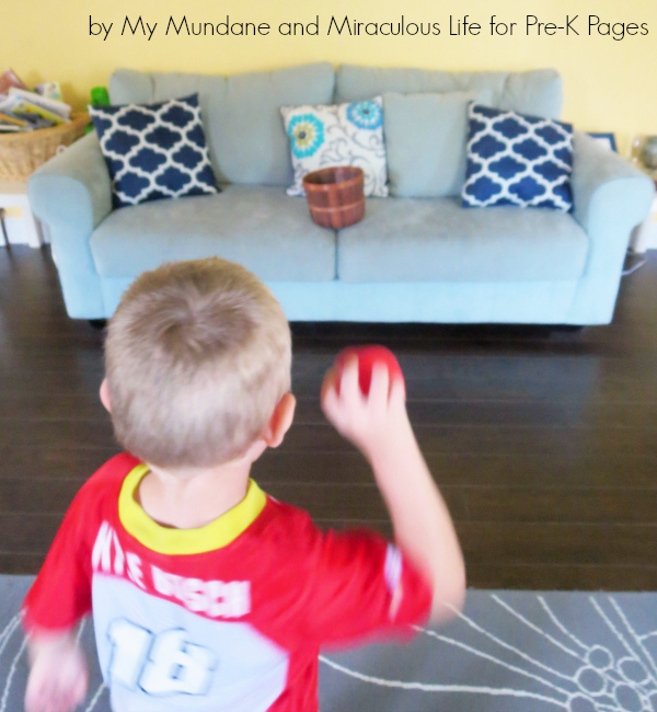 apple gross motor tossing balls