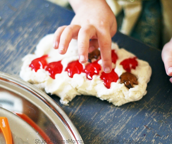plastic leaves in play dough