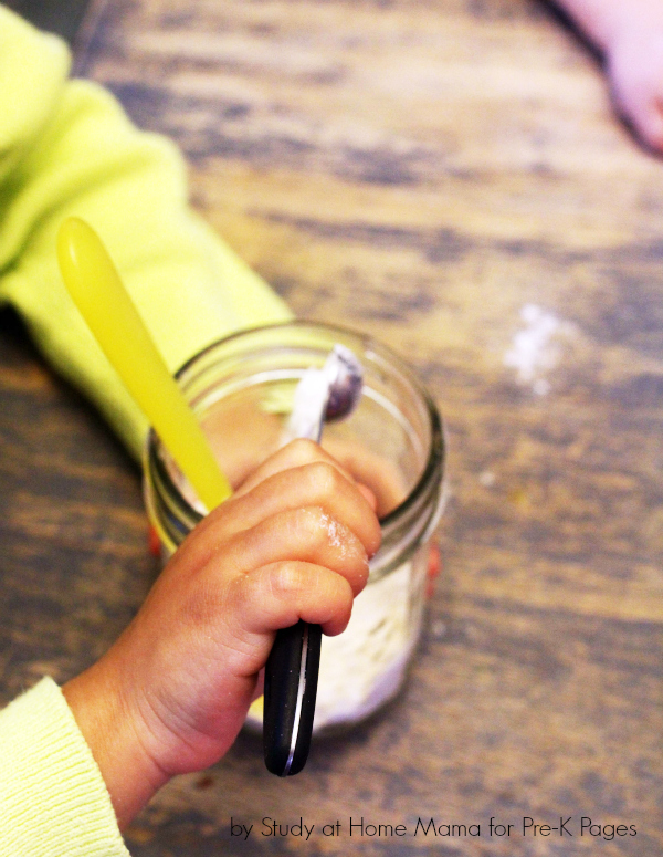 child assembling gingerbread jar cake recipe