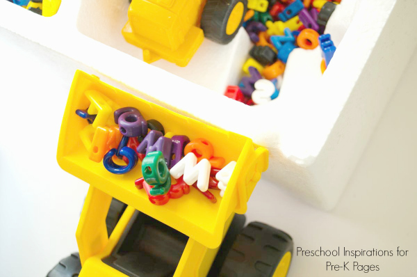 bulldozer with alphabet letters