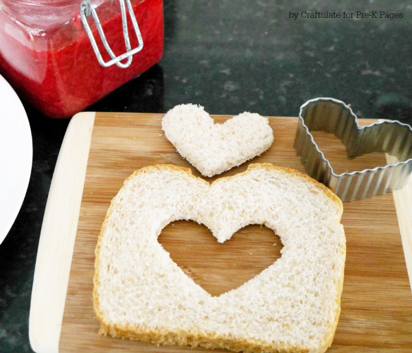 bread with heart cut out in middle for valentines day snack