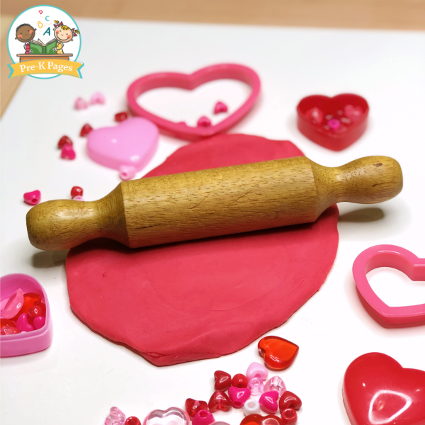 Rolling Red Playdough for Valentine's Day