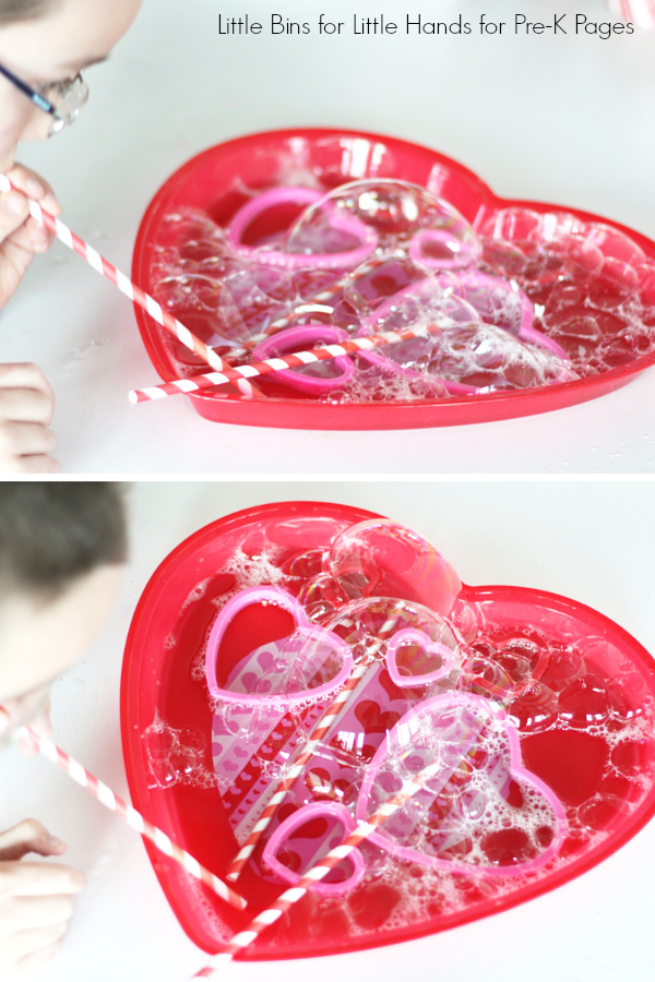 Valentine Bubble Science Activity Kid Blowing Bubbles into a heart shaped dish