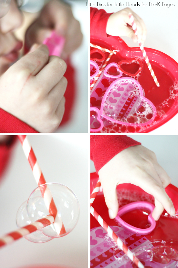 Valentine Bubble Science Activity For Preschool student exploring bubble science by blowing bubbles