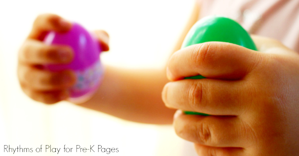 Child shaking Upcycled plastic egg music shakers