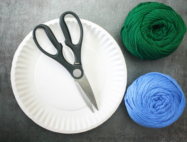 paper plate, scissors and yarn for earth day craft