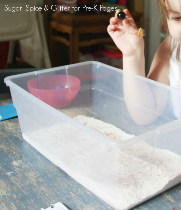 making craters dropping marbles in flour