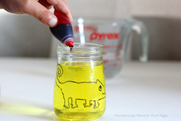 red food coloring added to jar of yellow water