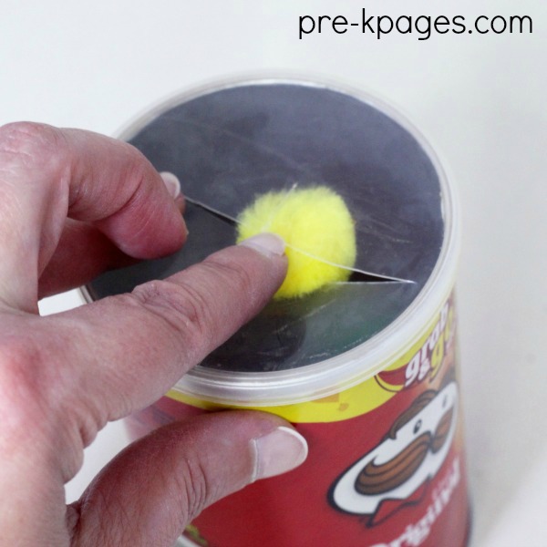 Pom Pom Push Activity to Strengthen Fine Motor Skills