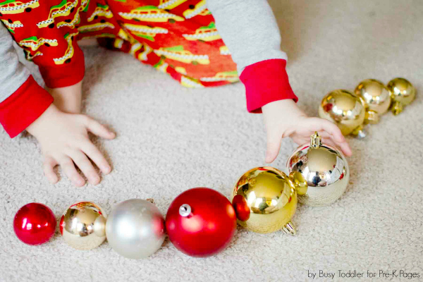 holiday ornament lined up in a pattern