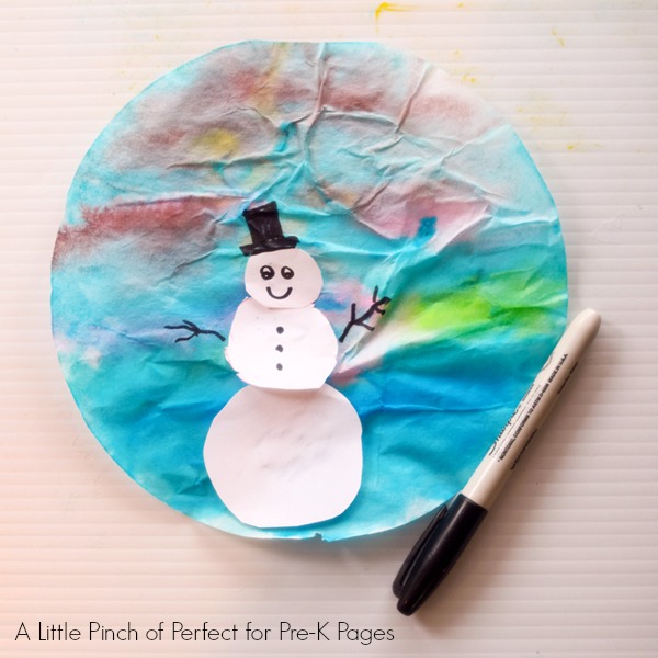 painted coffee filter with snowman on it
