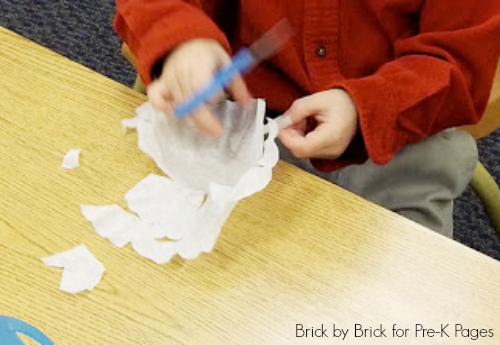cutting snowflakes