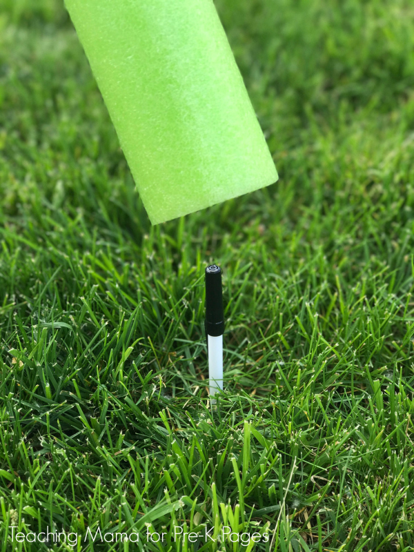 obstacle course pool noodle being inserted into post