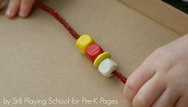 pipe cleaner with beads strung on it