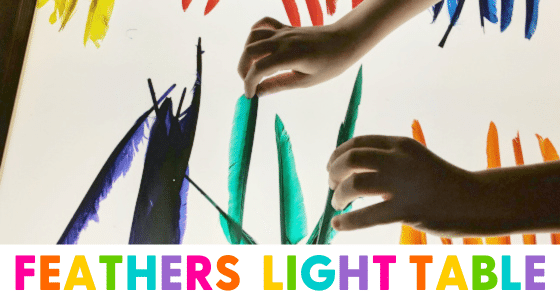 children playing with colorful feathers on the light table