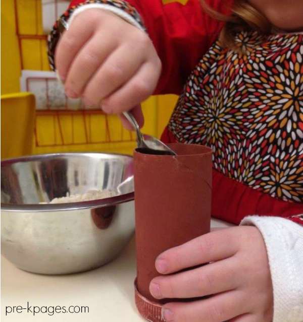 rice spooned into tube