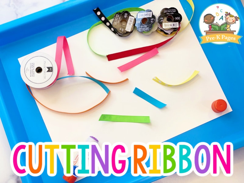 Cutting Ribbon in Preschool