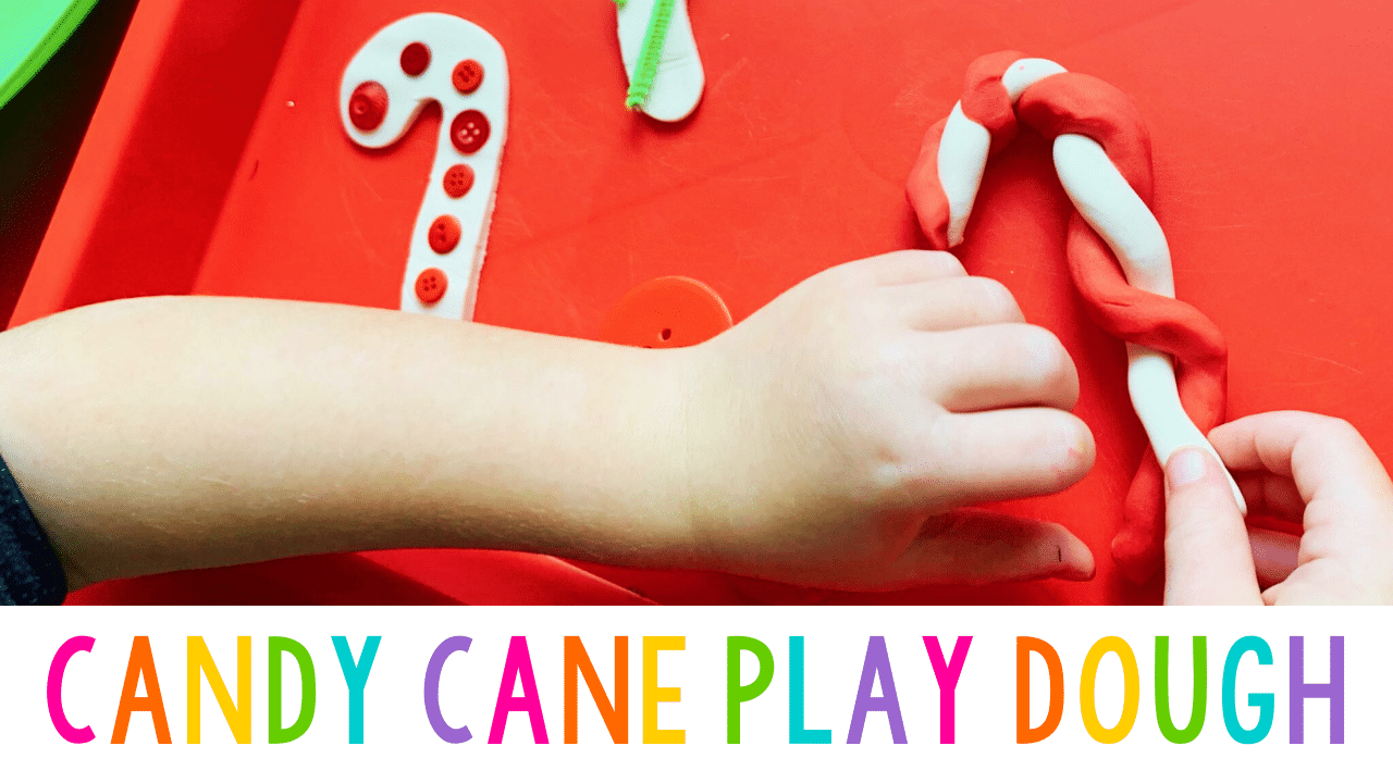 red tray with child making candy canes with dough