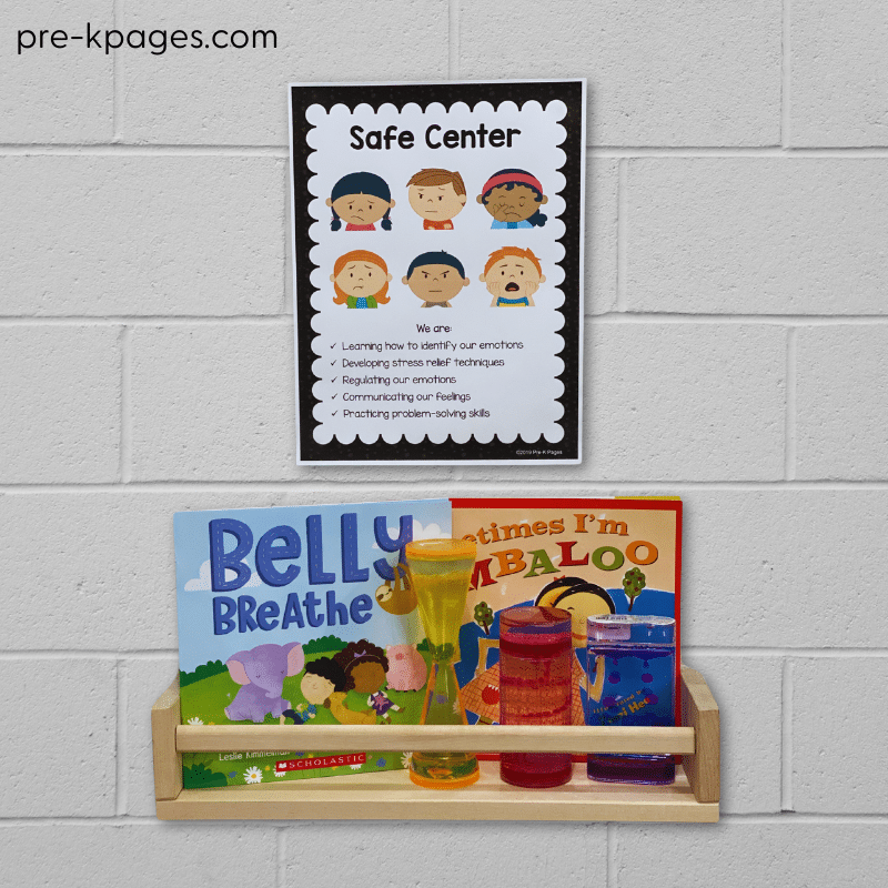 books sitting on a rack hanging on the wall