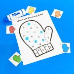 white paper on tabletop featuring letters of the alphabet