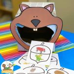 Picture of a squirrel face with wide open mouth.