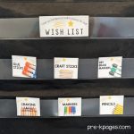 black pocket chart with supply cards